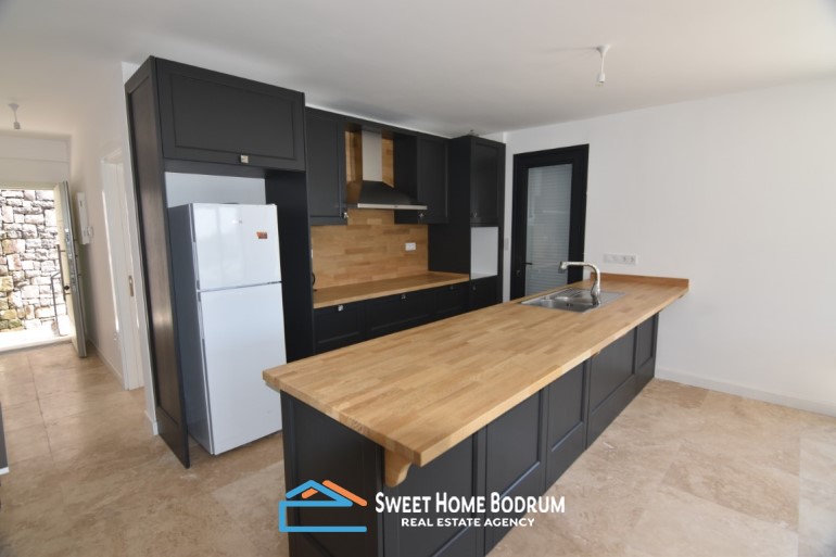 Gümüşlük'te satılık 3+1 özel bahçeli villa
