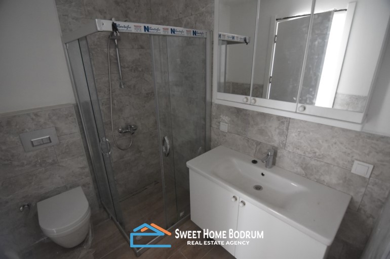 Bodrum Gümüşük'te site içinde satılık 2+1 daire