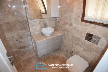 Bodrum Gümüşlük'te site içinde satılık deniz manzaralı daire