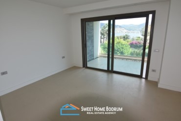 Gündoğan'da kendi plajı ve sosyal tesisi olan site içinde daire