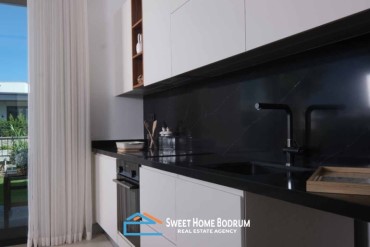 Bodrum Kadıkalesi'nde Denize Yakın Site İçinde Satılık Tek Katlı Villalar