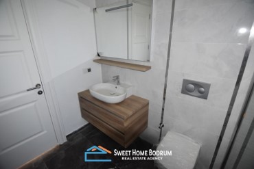 Bodrum Turgutreis'te satılık denize yakın, site içinde tek katlı villa