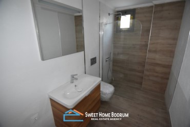 Bodrum Turgutreis'te satılık denize yakın, site içinde tek katlı villa