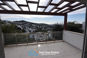 Bodrum Gümüşük'te site içinde satılık 2+1 daire