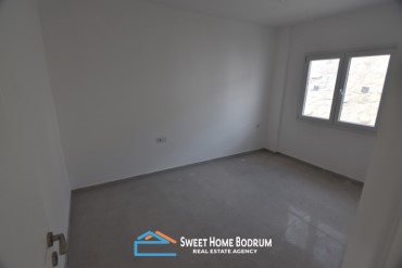 Bodrum Gümüşük'te site içinde satılık 2+1 daire