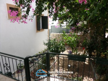 Gündoğan Yalıkent Sitesi'nde satılık tripleks villa