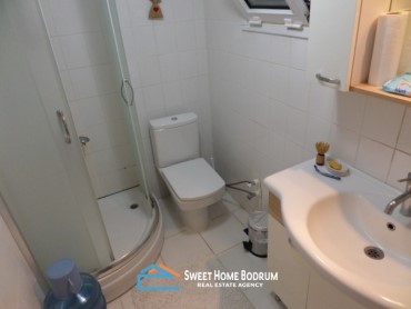 Gündoğan Yalıkent Sitesi'nde satılık tripleks villa
