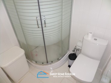 Gündoğan Yalıkent Sitesi'nde satılık tripleks villa